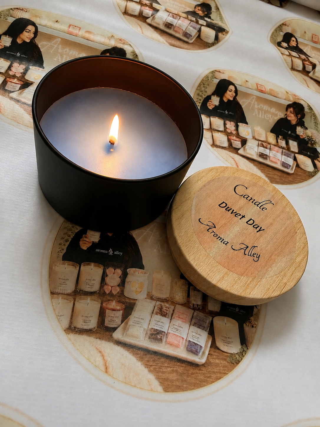 Duvet Day scented candle in our matte black tin