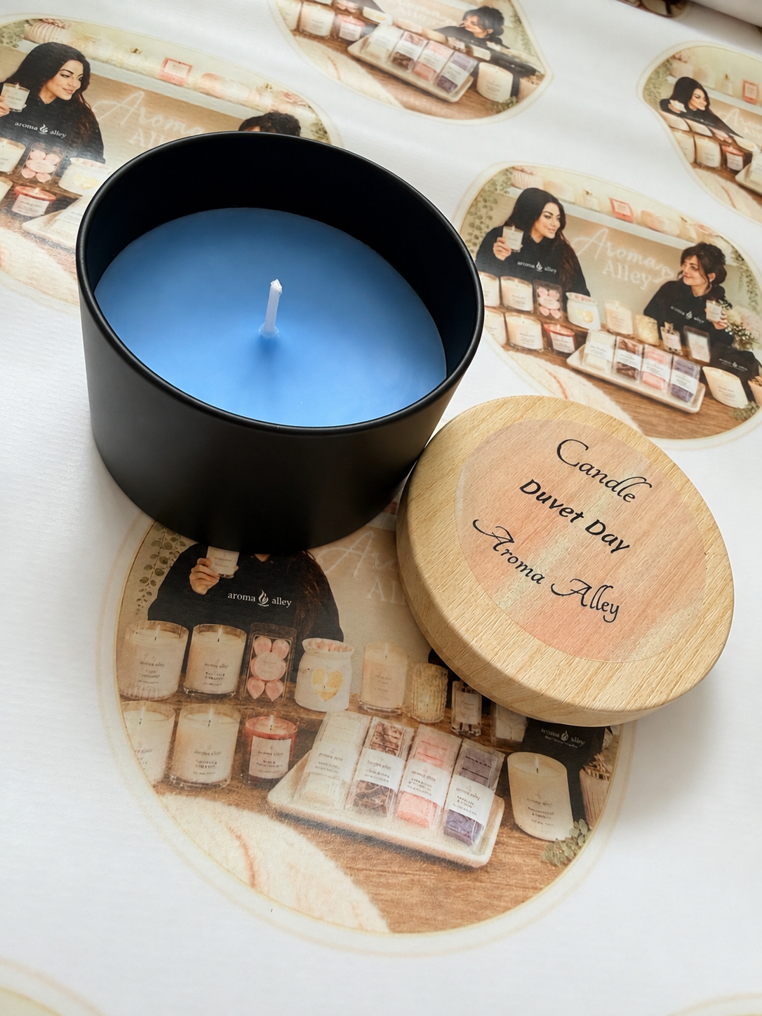 Duvet Day scented candle in our matte black tin